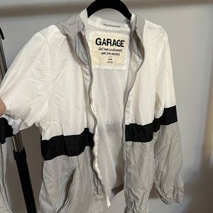 White gray and black garage windbreaker